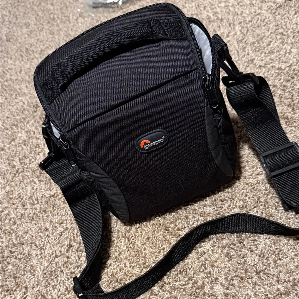 Lowepro Format 140 padded camera case w/handle & shoulder or crossbody strap